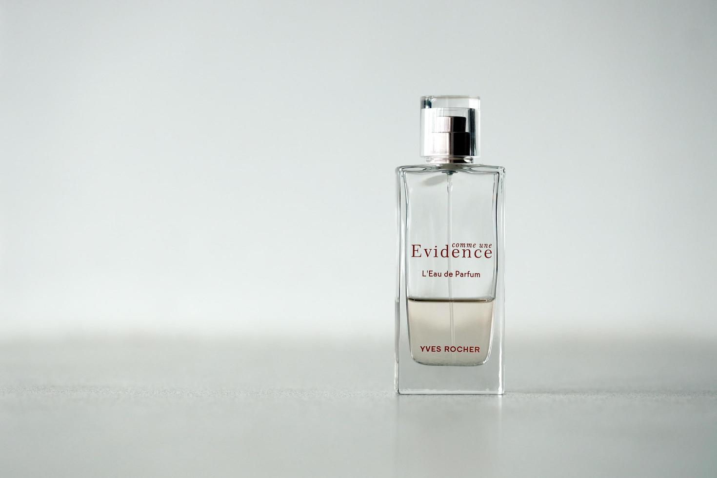 TERNOPIL, UKRAINE - SEPTEMBER 2, 2022 Yves Rocher Comme Une Evidence perfume bottle on monochrome background photo