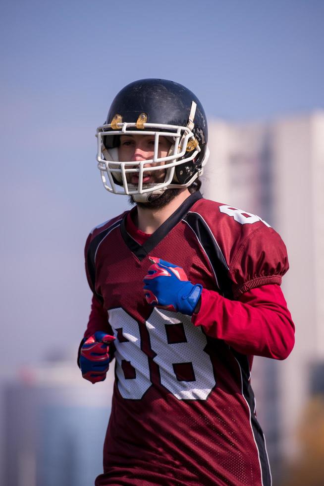 american football player in action photo