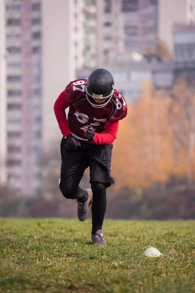 american football player in action photo