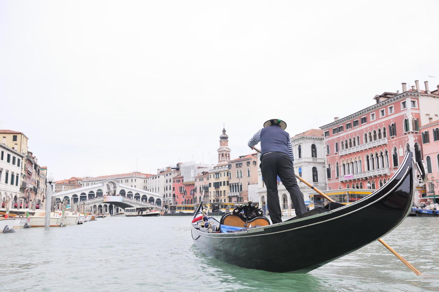 venice italy, gondola driver in grand channel photo