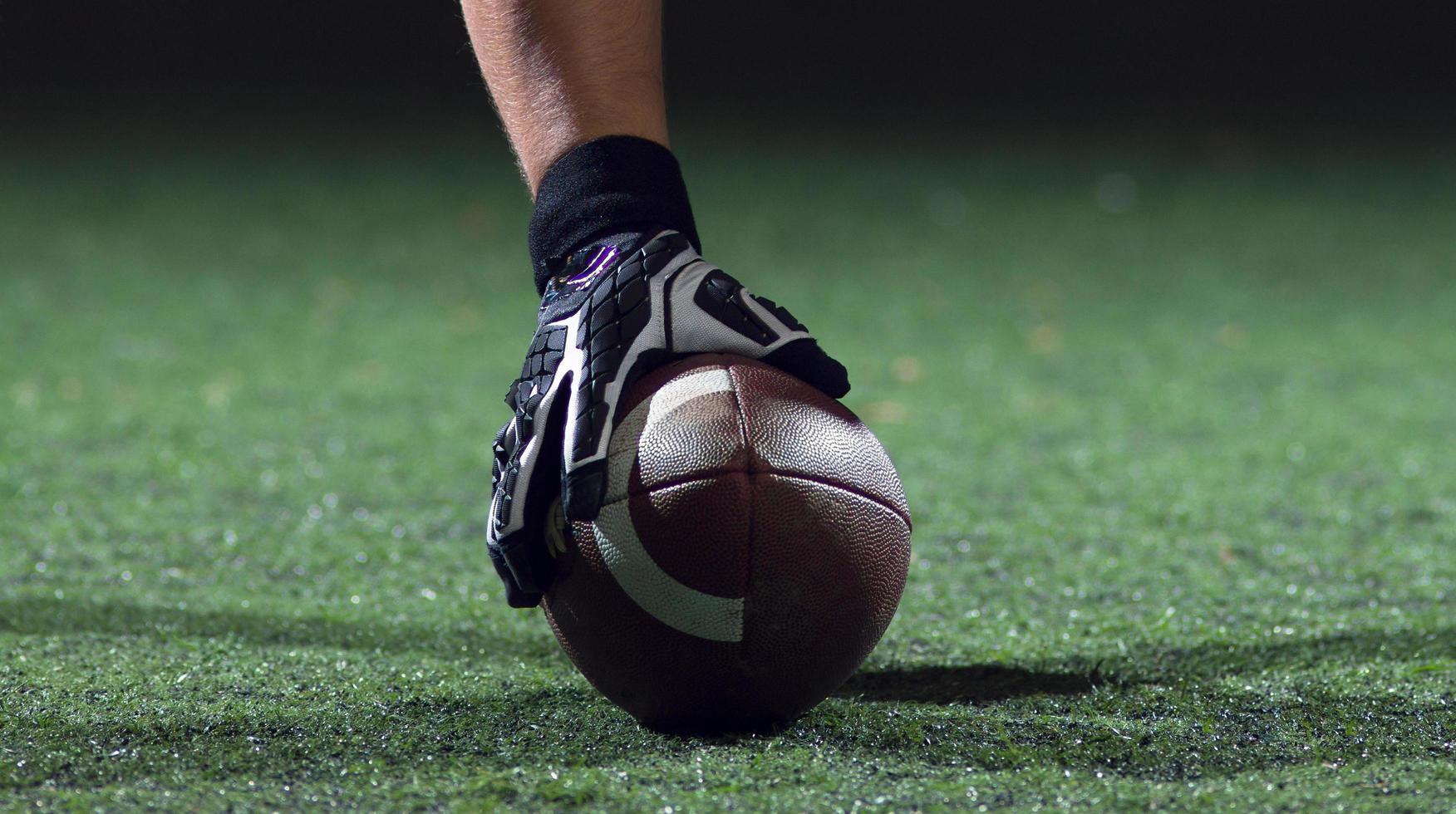 American football player starting football game photo
