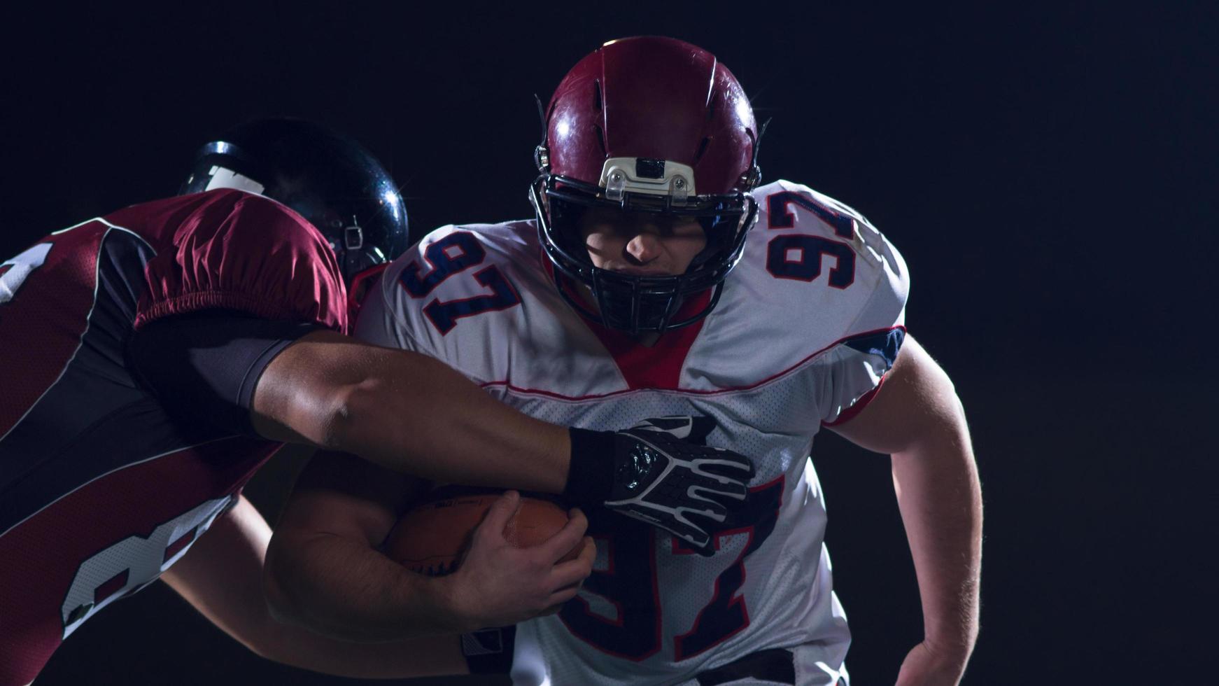 American football players in action photo