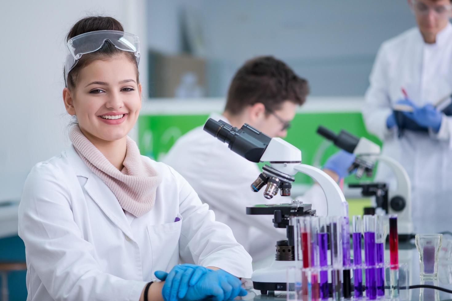 Group of young medical students doing research photo