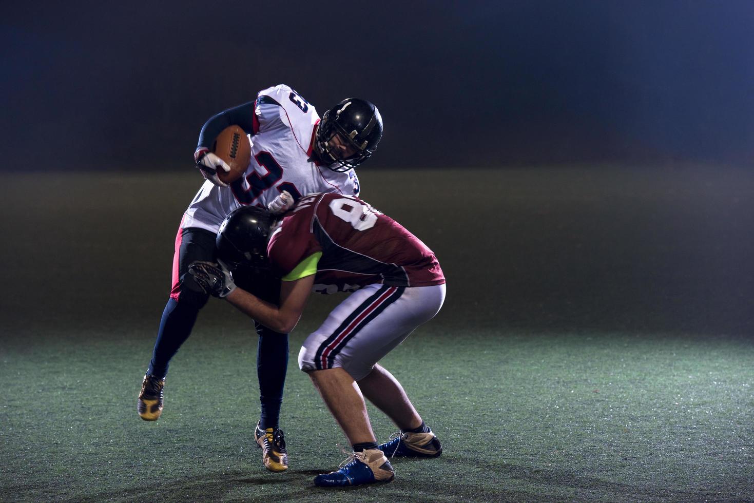 jugadores de fútbol americano en acción foto