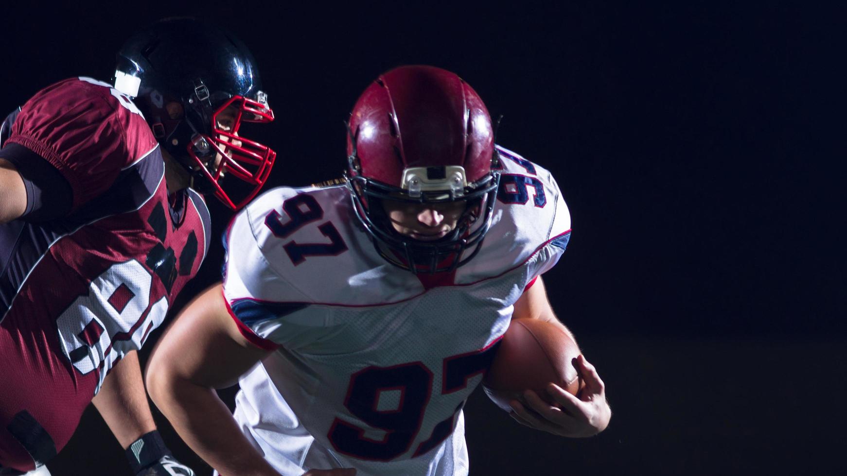 American football players in action photo