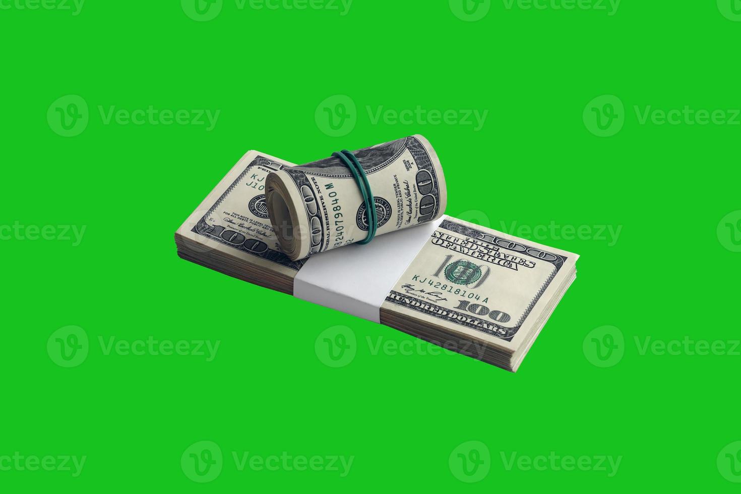 Bundle of US dollar bills isolated on chroma keyer green. Pack of american money with high resolution on perfect green mask photo