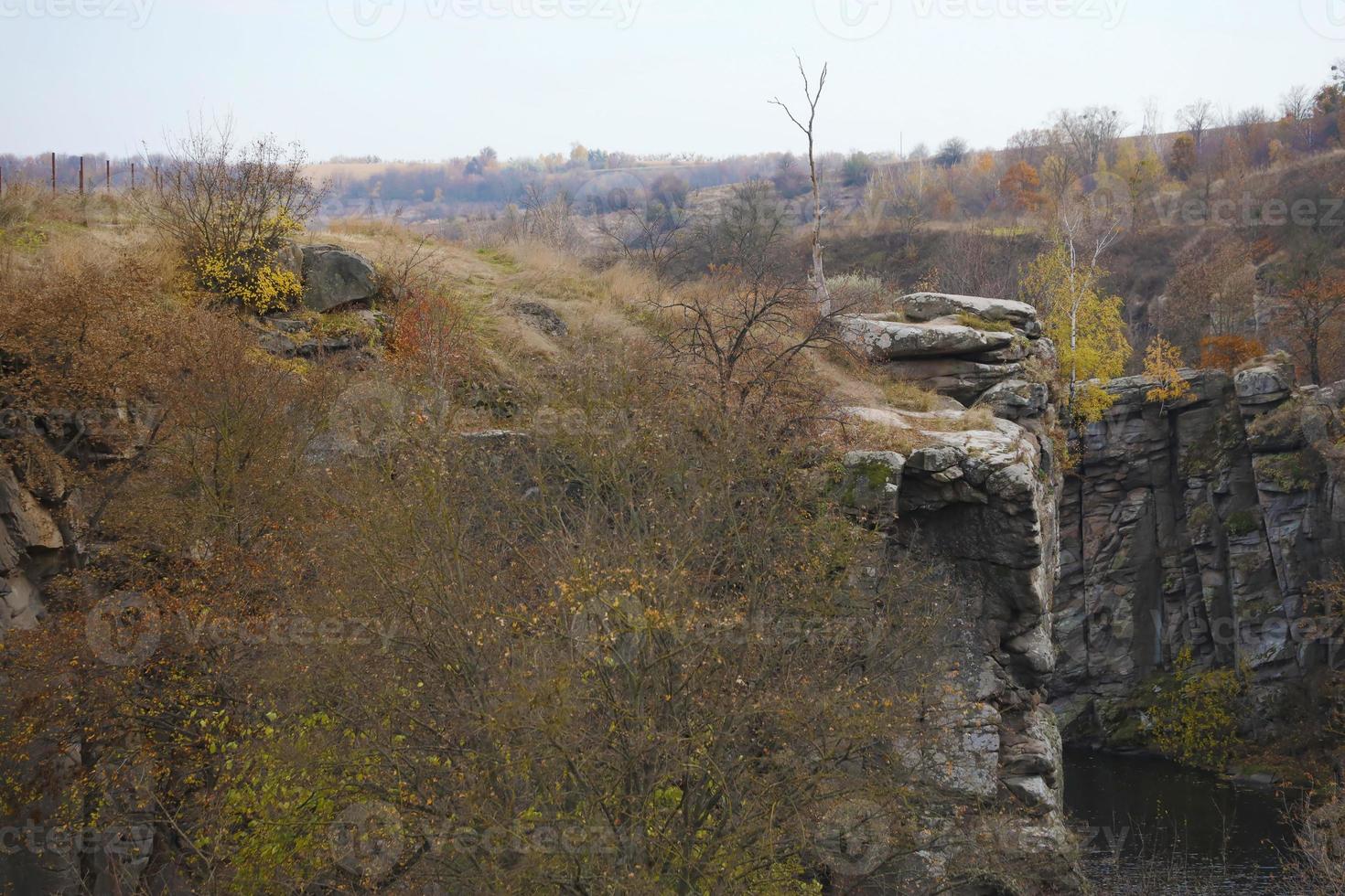 Granite rocks of Bukski Canyon with the Girskyi Tikych River. Picturesque landscape and beautiful place in Ukraine photo