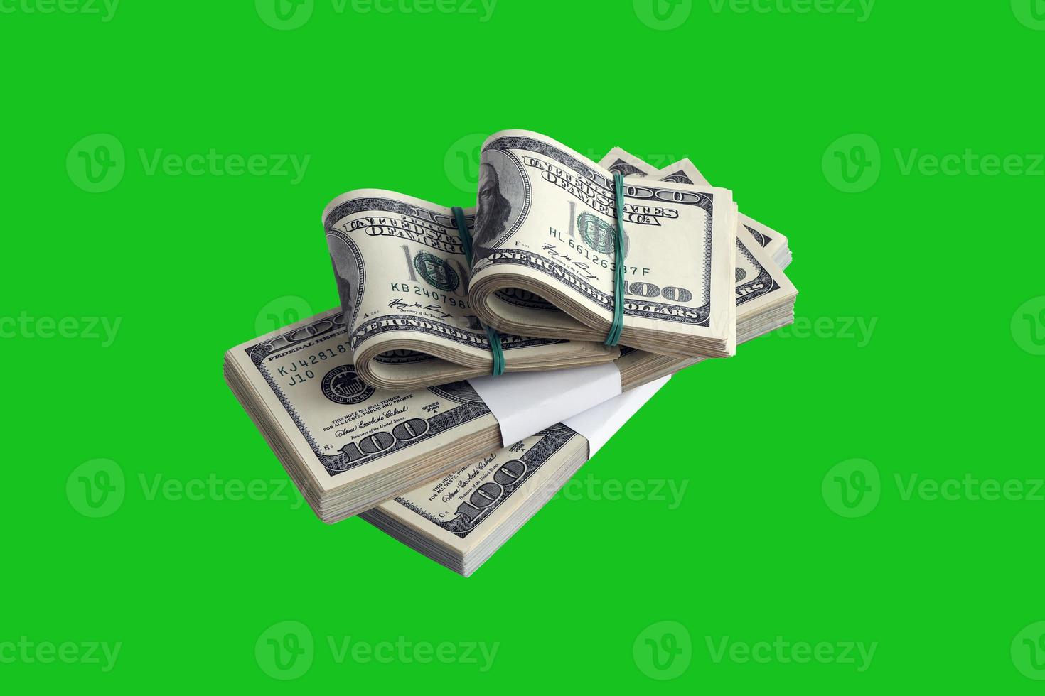 Bundle of US dollar bills isolated on chroma keyer green. Pack of american money with high resolution on perfect green mask photo