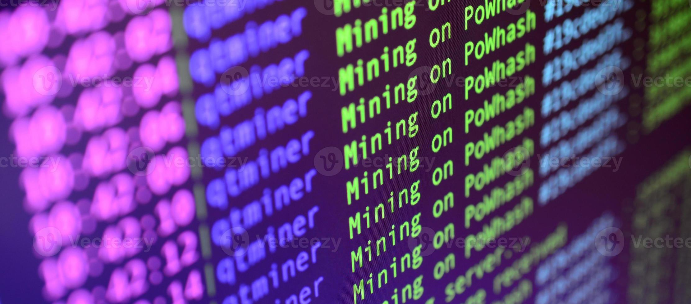 Macro snapshot of the program interface for crypto currency mining on the monitor of an office computer. The concept of mining bitcoins. The flow of information strings and data photo