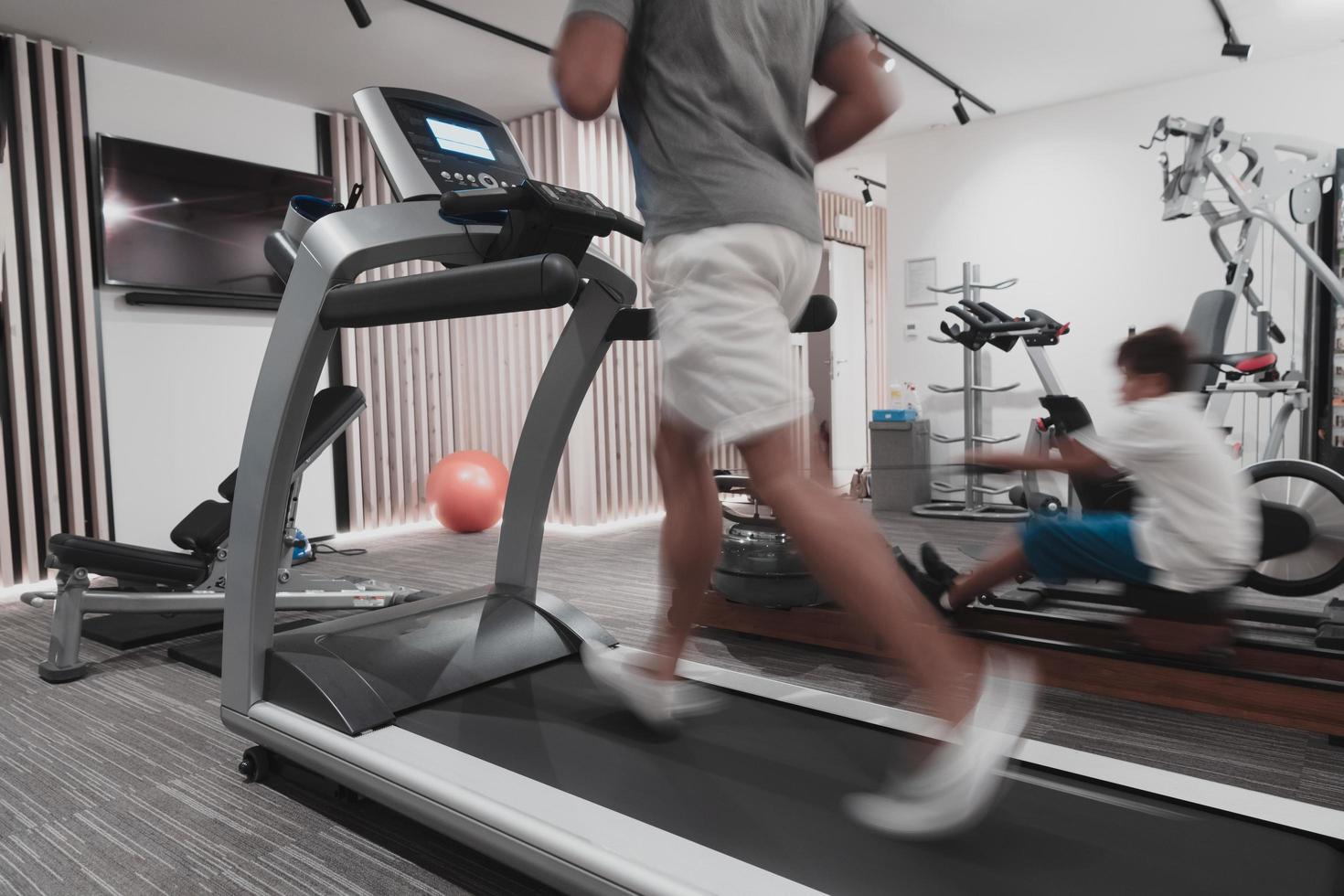 Father and son train together at home gym. The concept of healthy life. Selective focus photo