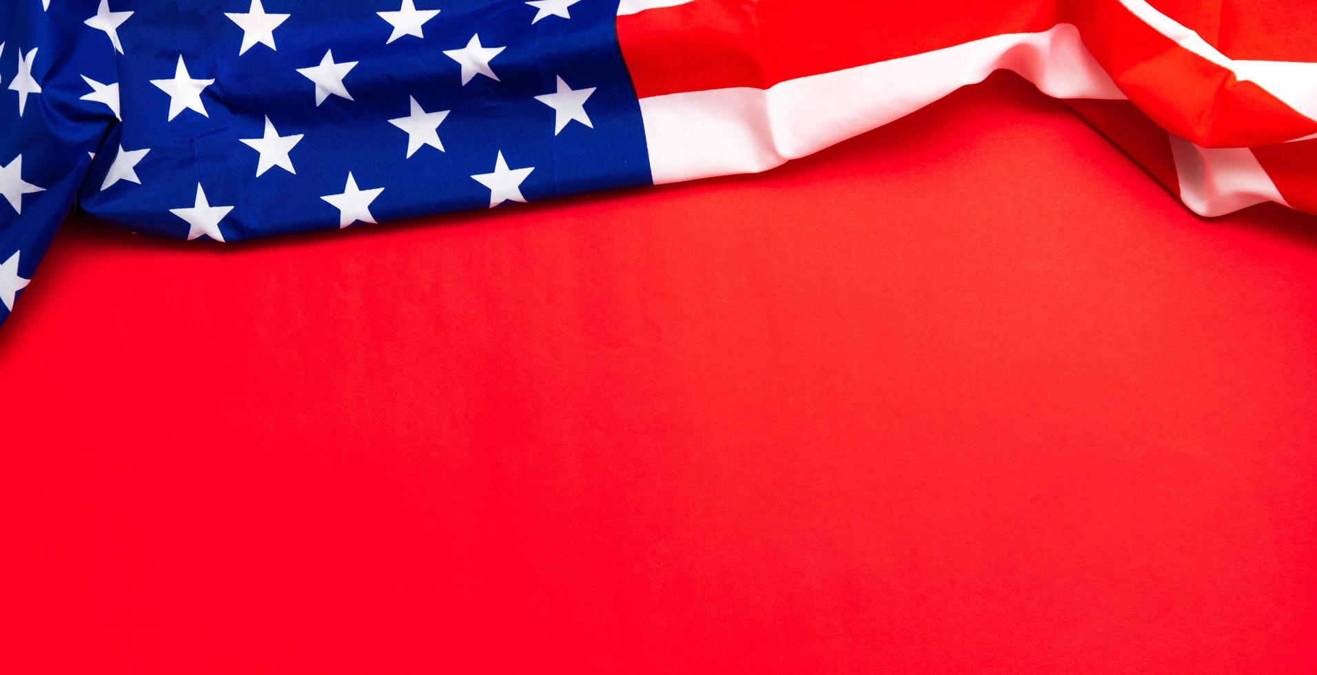 Happy Veterans Day concept. American flags against a blackboard background. November 11. photo