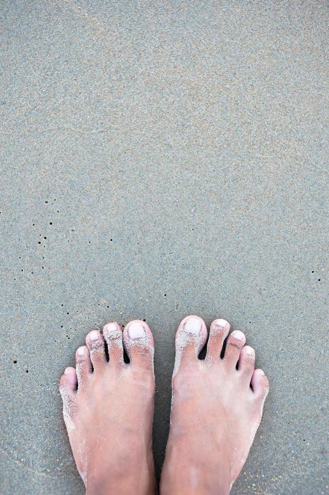 abstract closeup of sand pattern texture of a beach in the summer - vintage filter photo