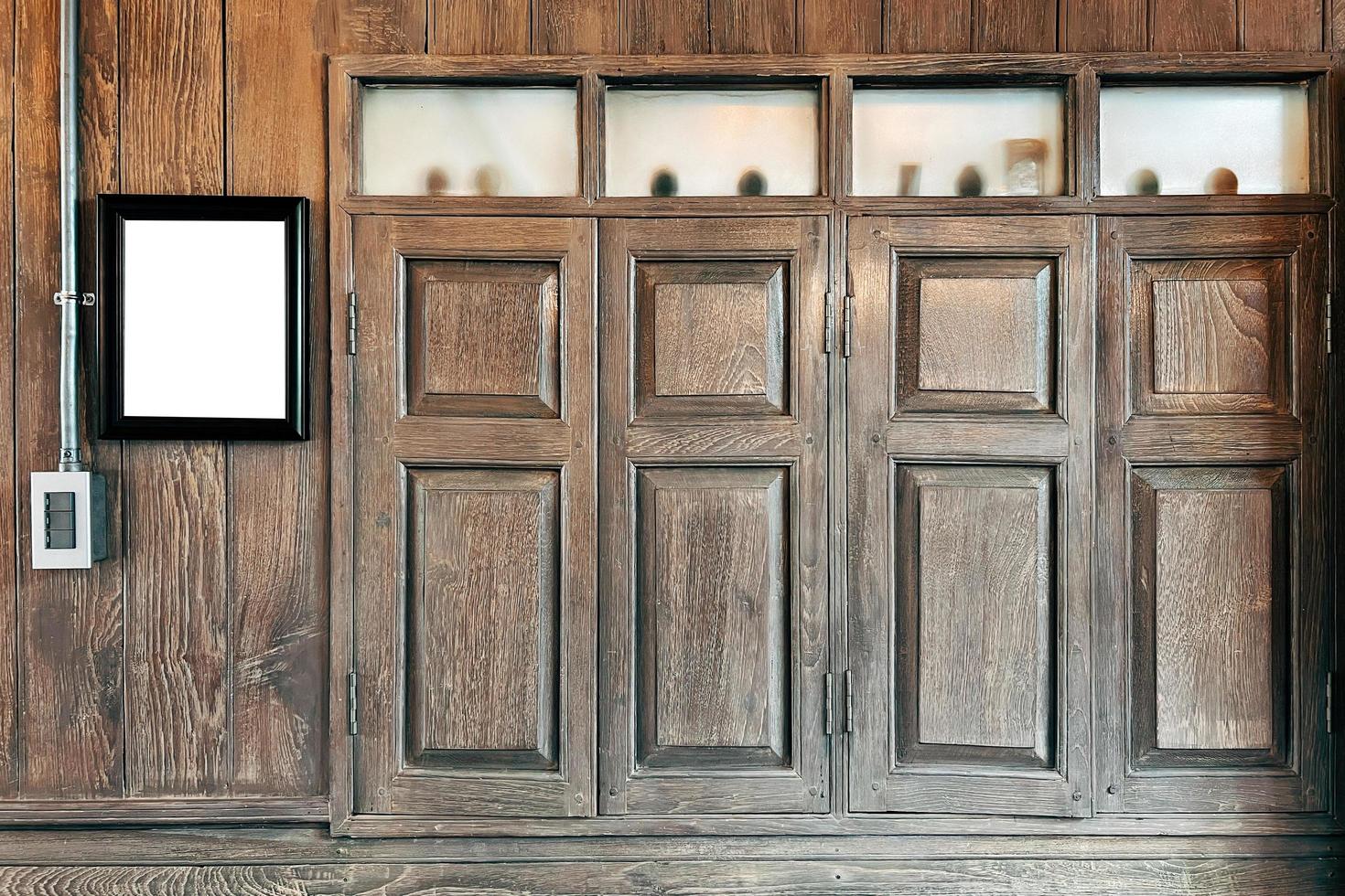 Close up of old vintage style and antique wooden window in Thailand. photo