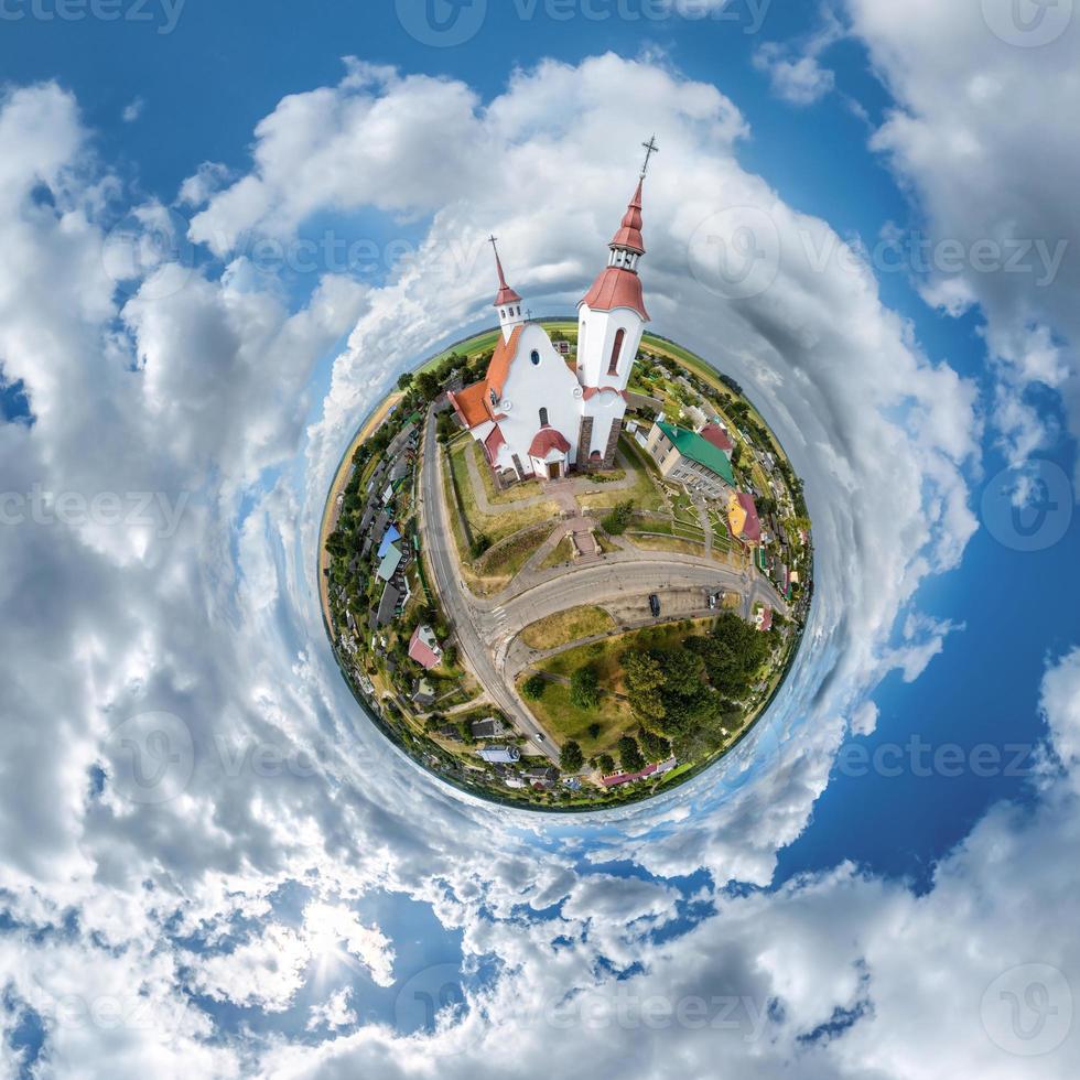 little planet transformation of spherical panorama 360 degrees. Spherical abstract aerial on church. Curvature of space. photo