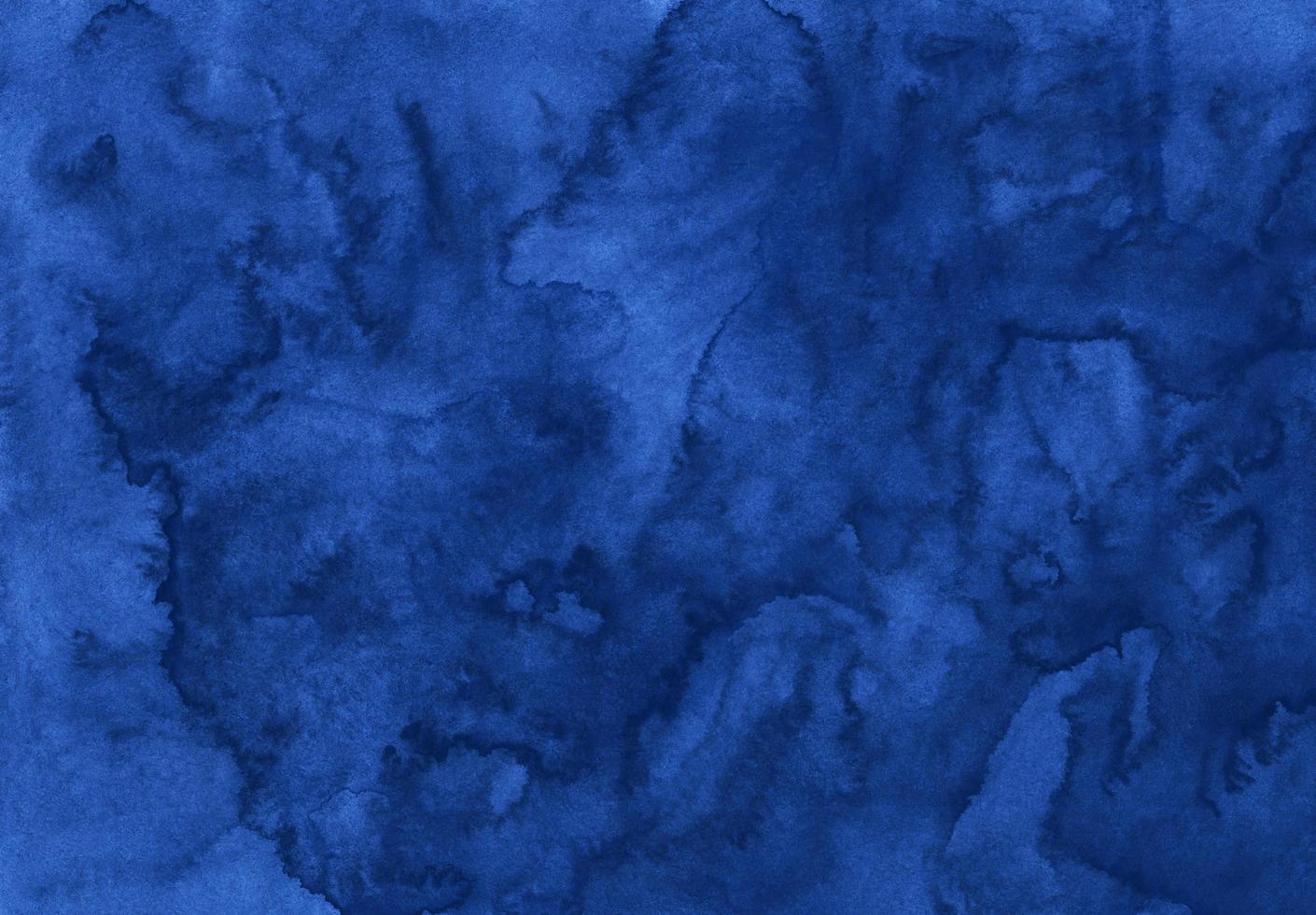 Watercolor deep blue background texture hand painted. Aquarelle abstract backdrop. Stains on paper. photo