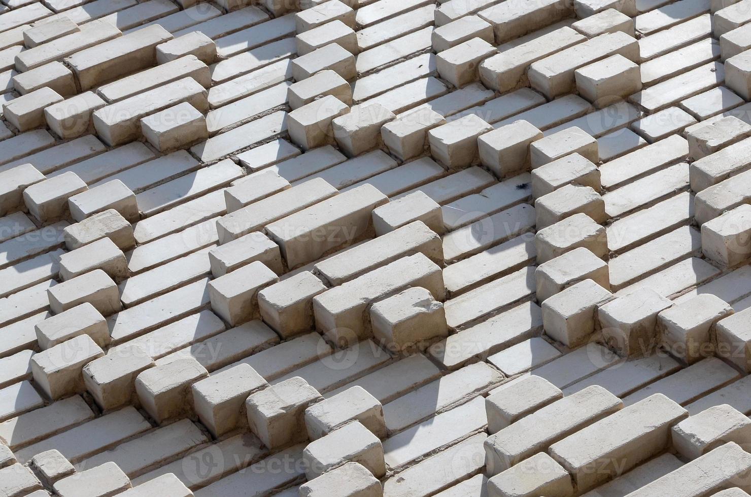 A pattern made of white bricks in the form of diamond shapes. Decoration of the walls during the Soviet Union photo