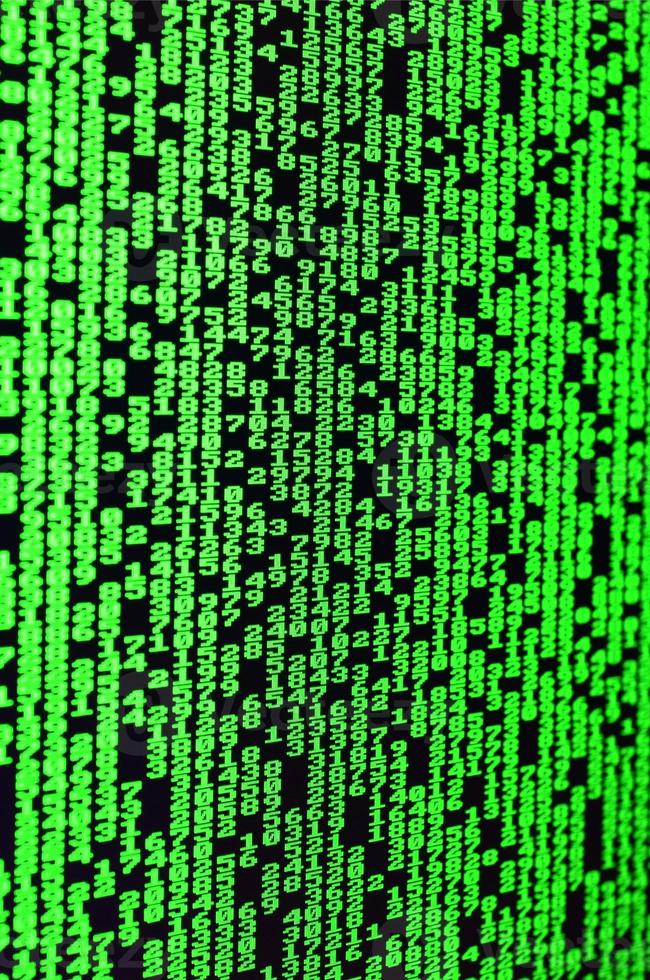 Macro of password selection on the monitor of the office computer. The concept of hacking the protection of a personal data keeper. The stream of supposed digital passwords of four and five digits photo