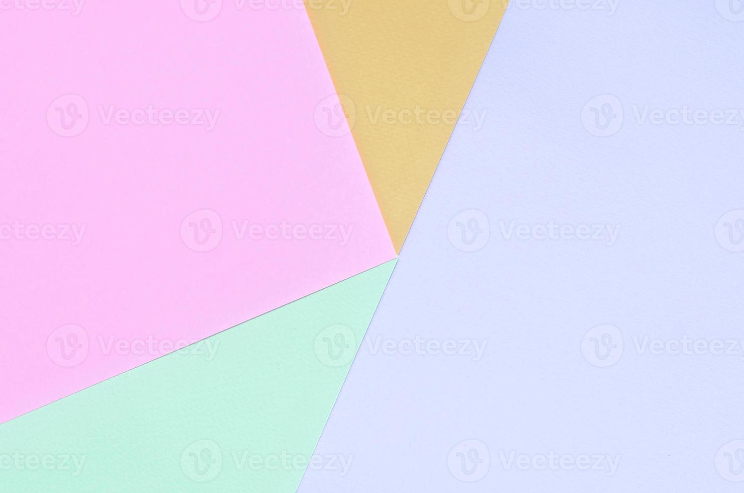 Texture background of fashion pastel colors. Pink, violet, orange and blue geometric pattern papers. photo