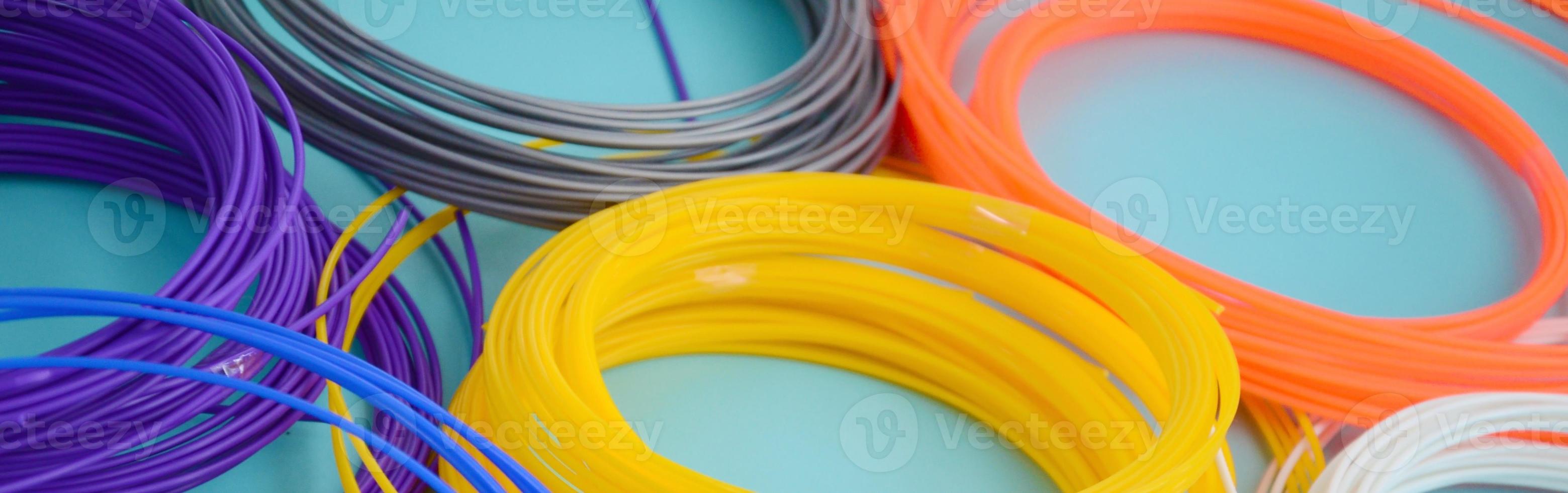 Plastic PLA and ABS filament material for printing on a 3D pen or printer of various colors photo