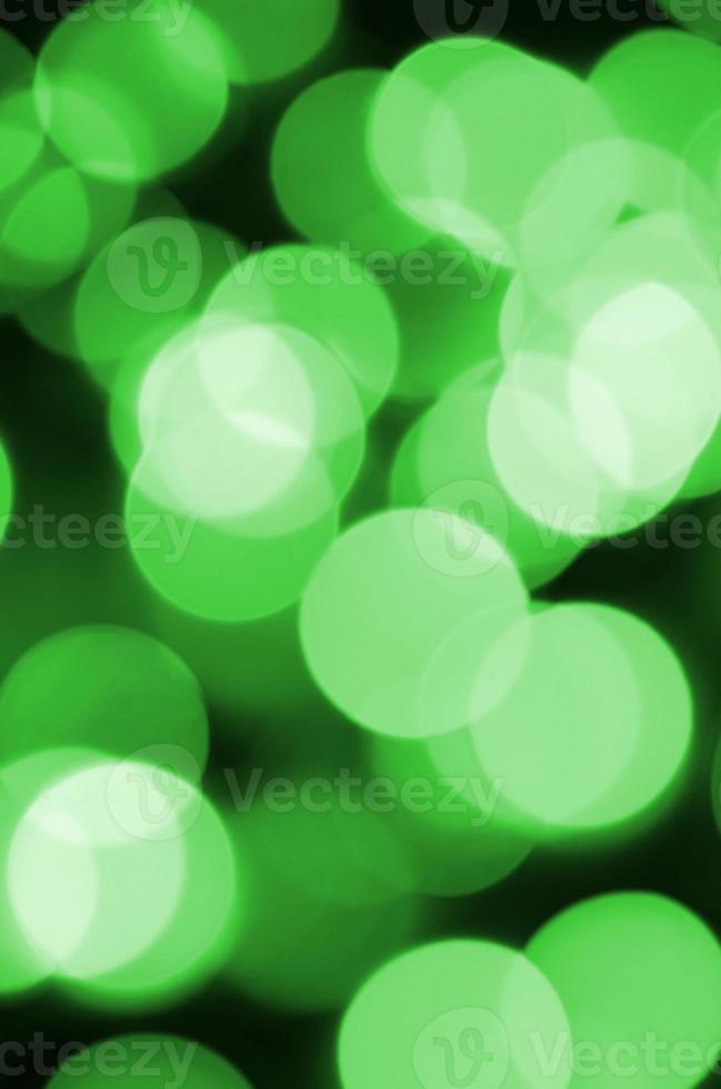 Navidad abstracta verde fondo luminoso borroso. imagen de luces bokeh artística desenfocada foto