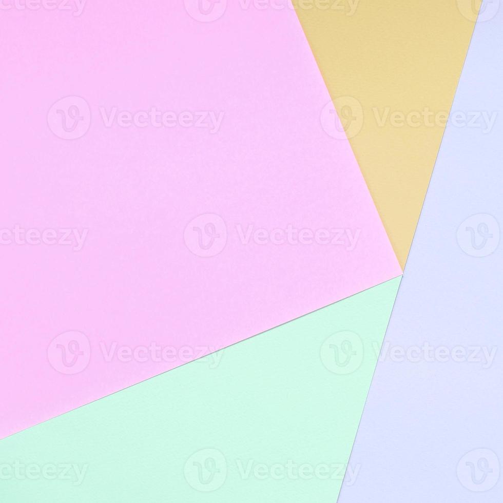 Texture background of fashion pastel colors. Pink, violet, orange and blue geometric pattern papers. photo