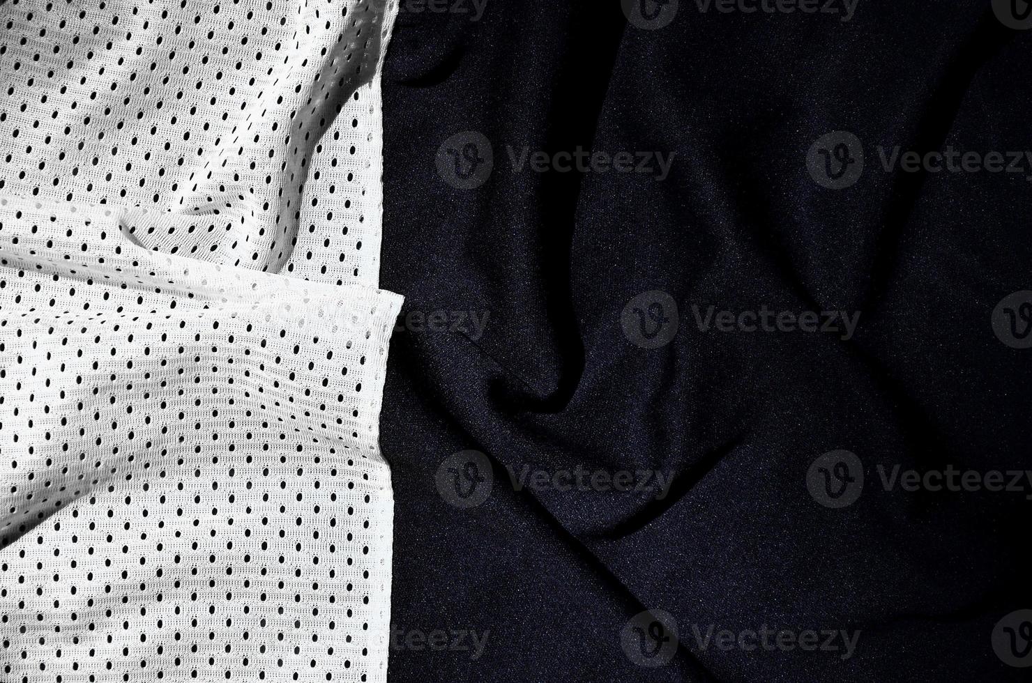 Sport clothing fabric texture background, top view of white cloth textile surface photo
