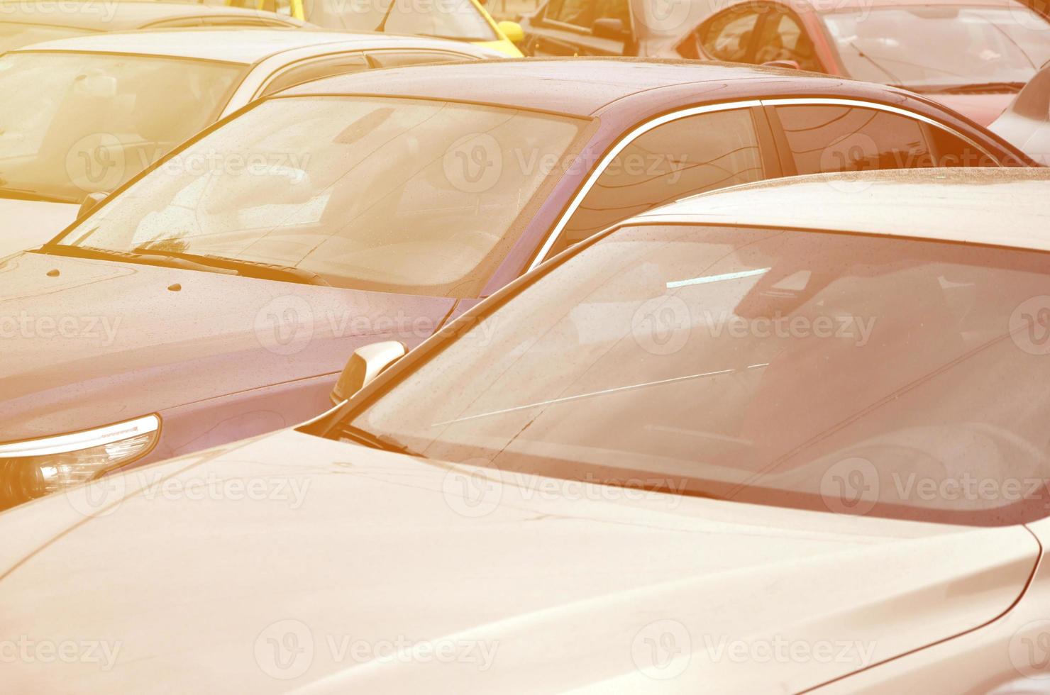 Roofs of several cars. A lot of cars stand close at rush hour photo