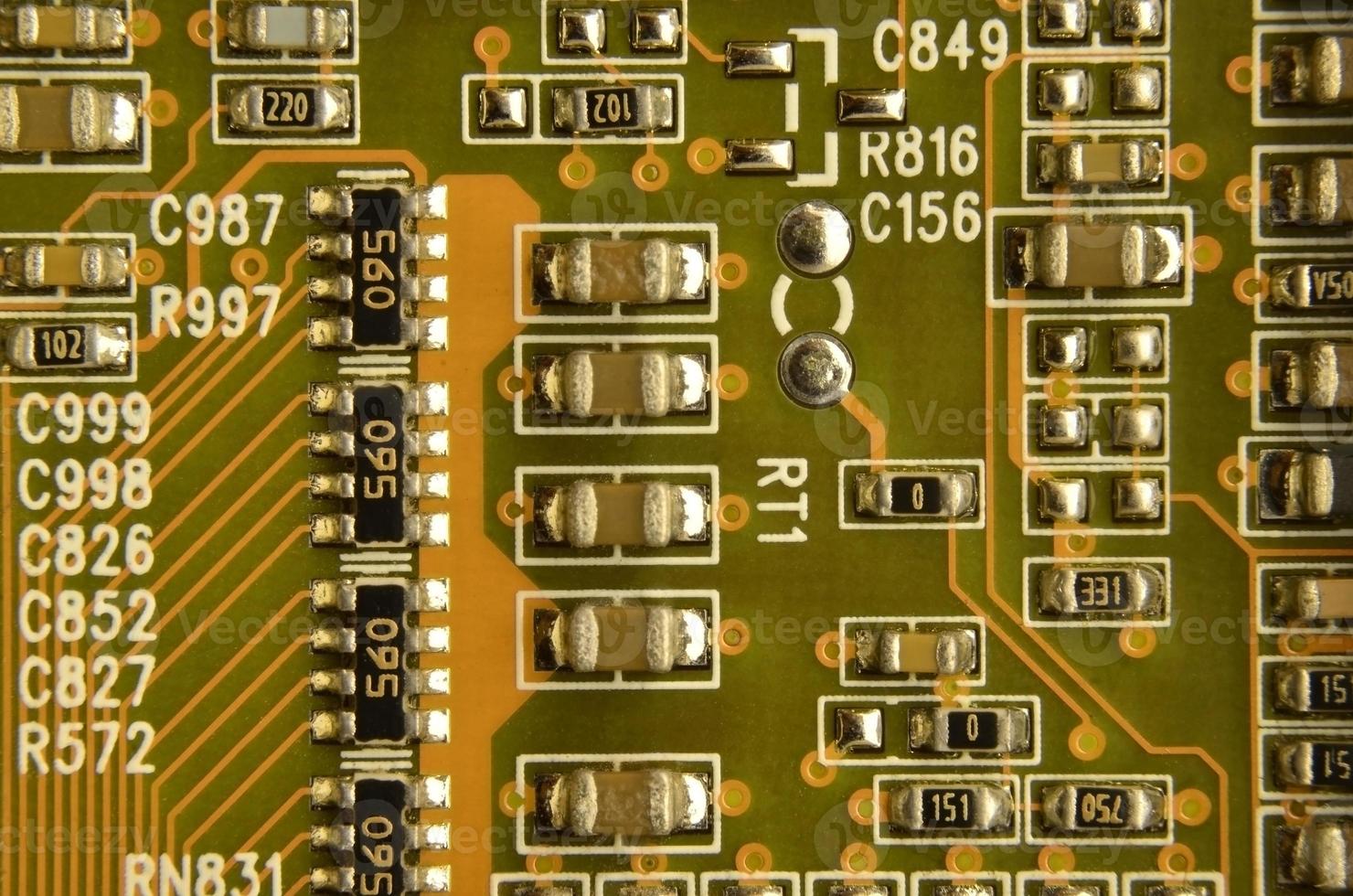 Close up of colored micro circuit board. Abstract technology background photo