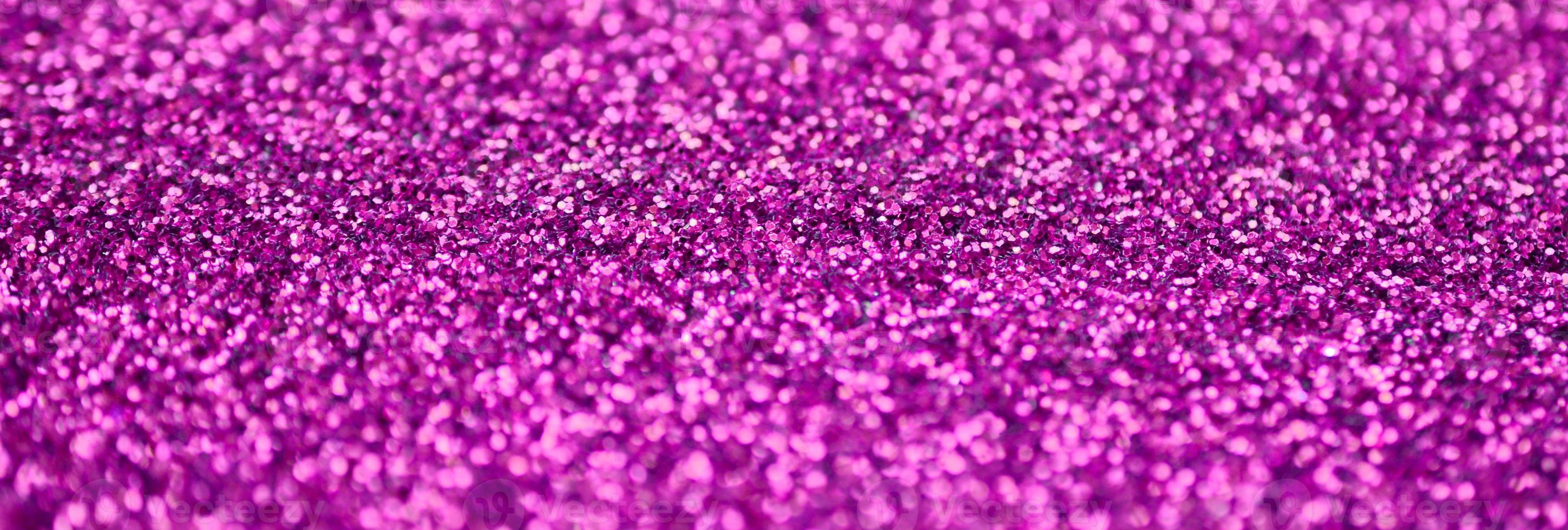 lentejuelas decorativas rosas. imagen de fondo con luces bokeh brillantes de elementos pequeños foto