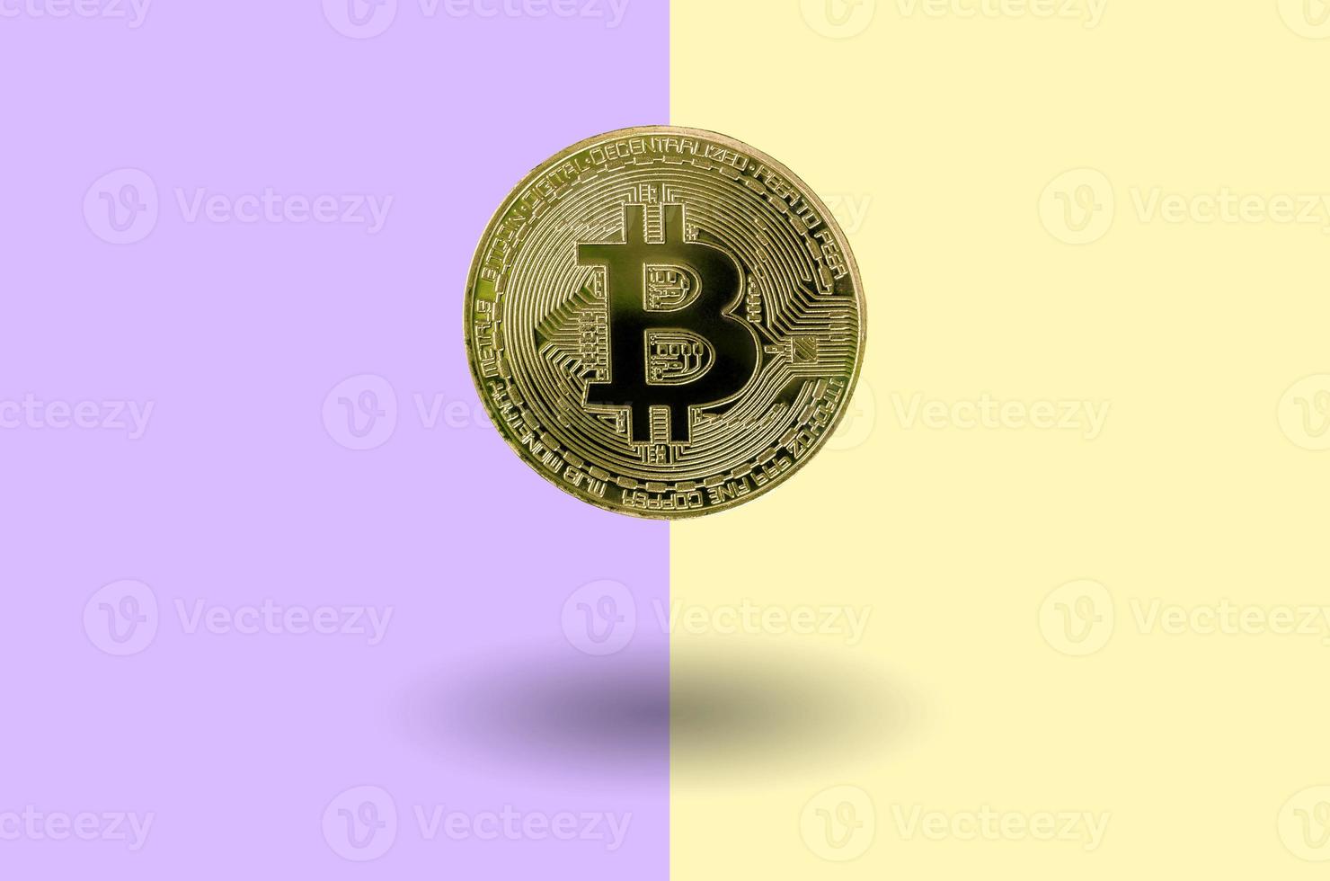 Cryptocurrency hard fork concept. Floating Golden bitcoin photo