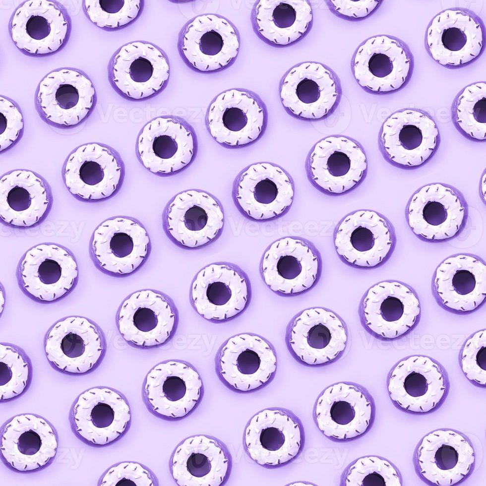 Many small plastic donuts lies on a pastel colorful background. Flat lay minimal pattern. Top view photo