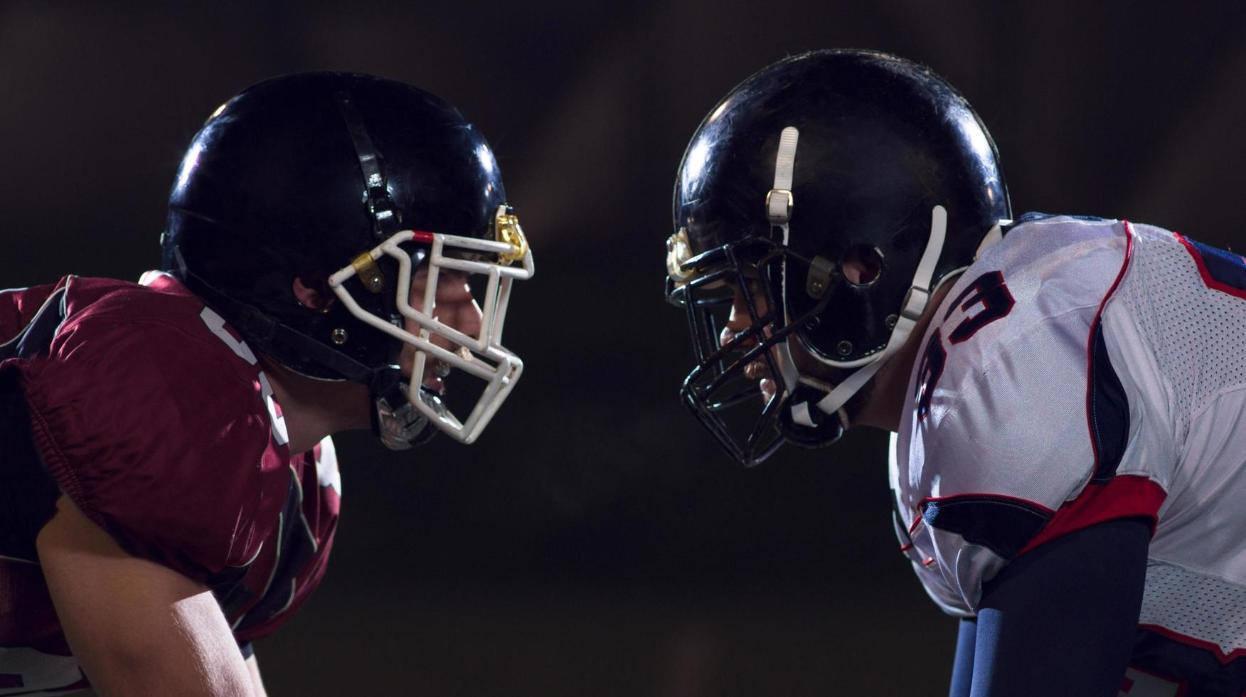 american football players are ready to start photo