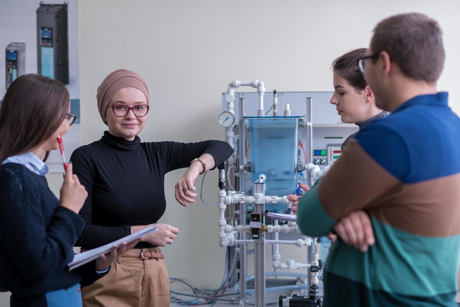 young students doing practice in the electronic classroom photo