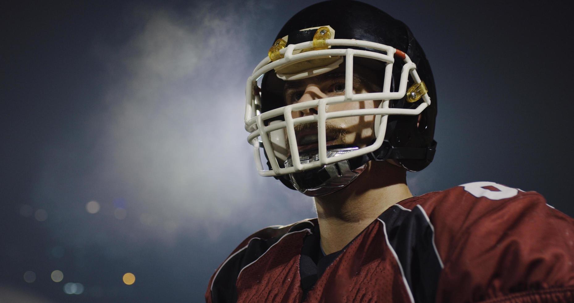 portrait of young confident American football player photo