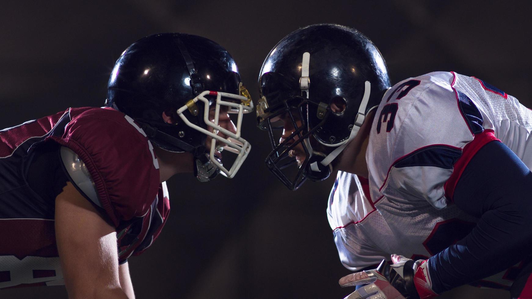 american football players are ready to start photo