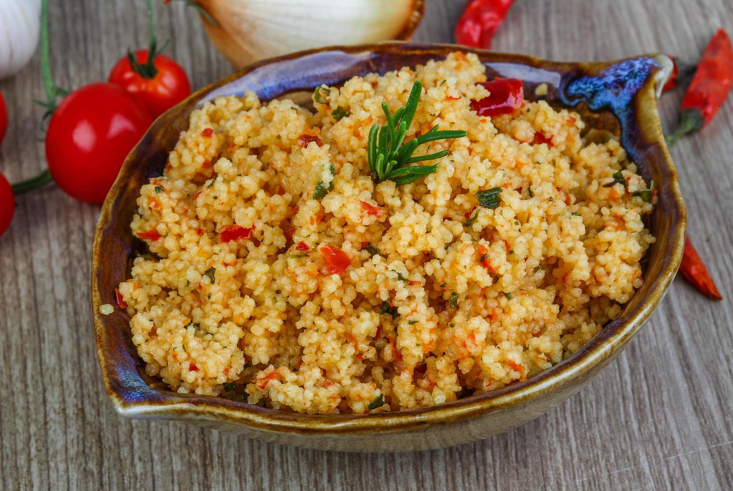 Couscous on wood photo