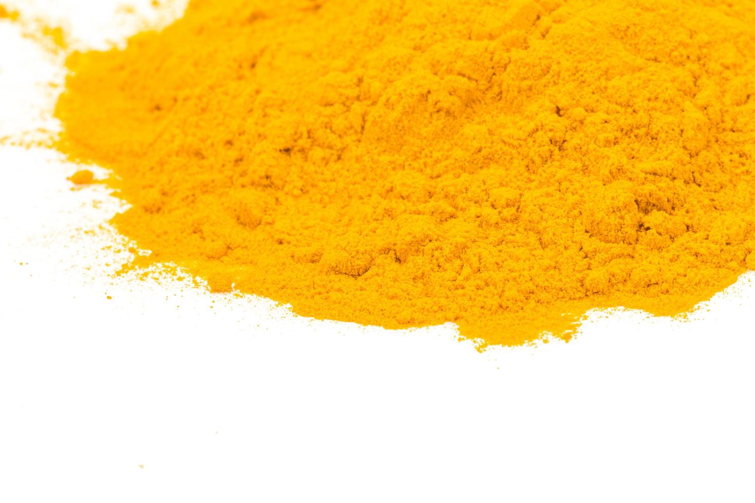 Curry powder on white photo