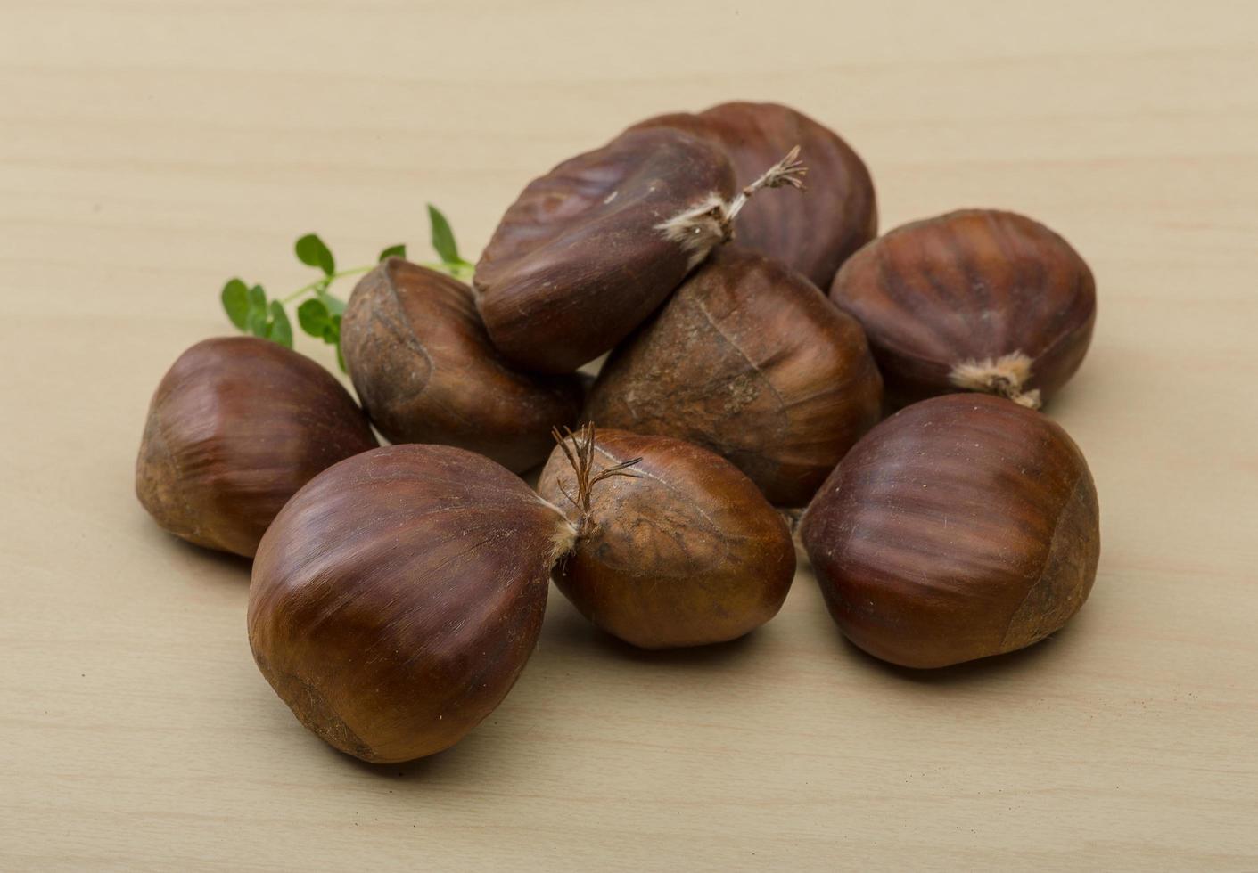 Chestnut on wood photo