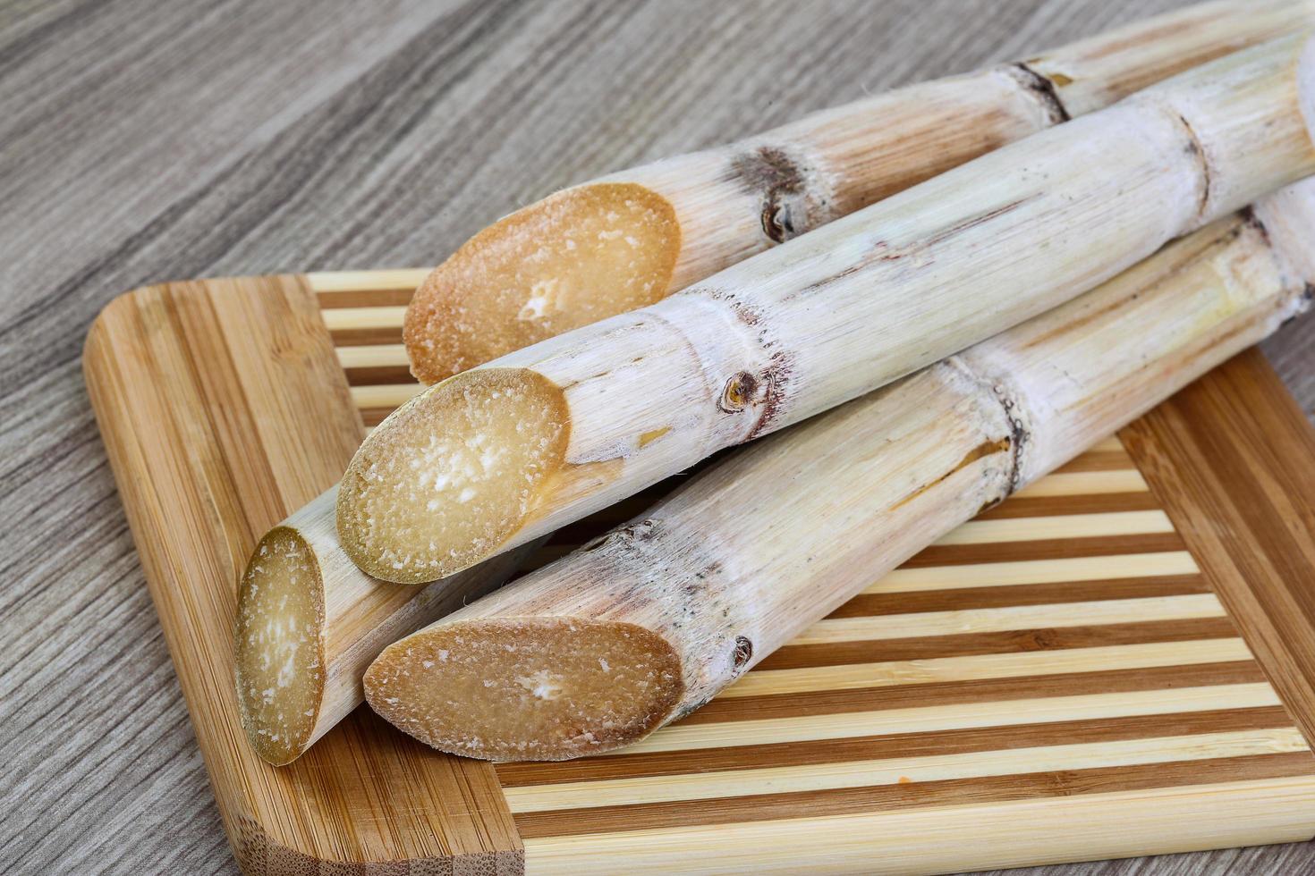 Sugar sticks on wood photo