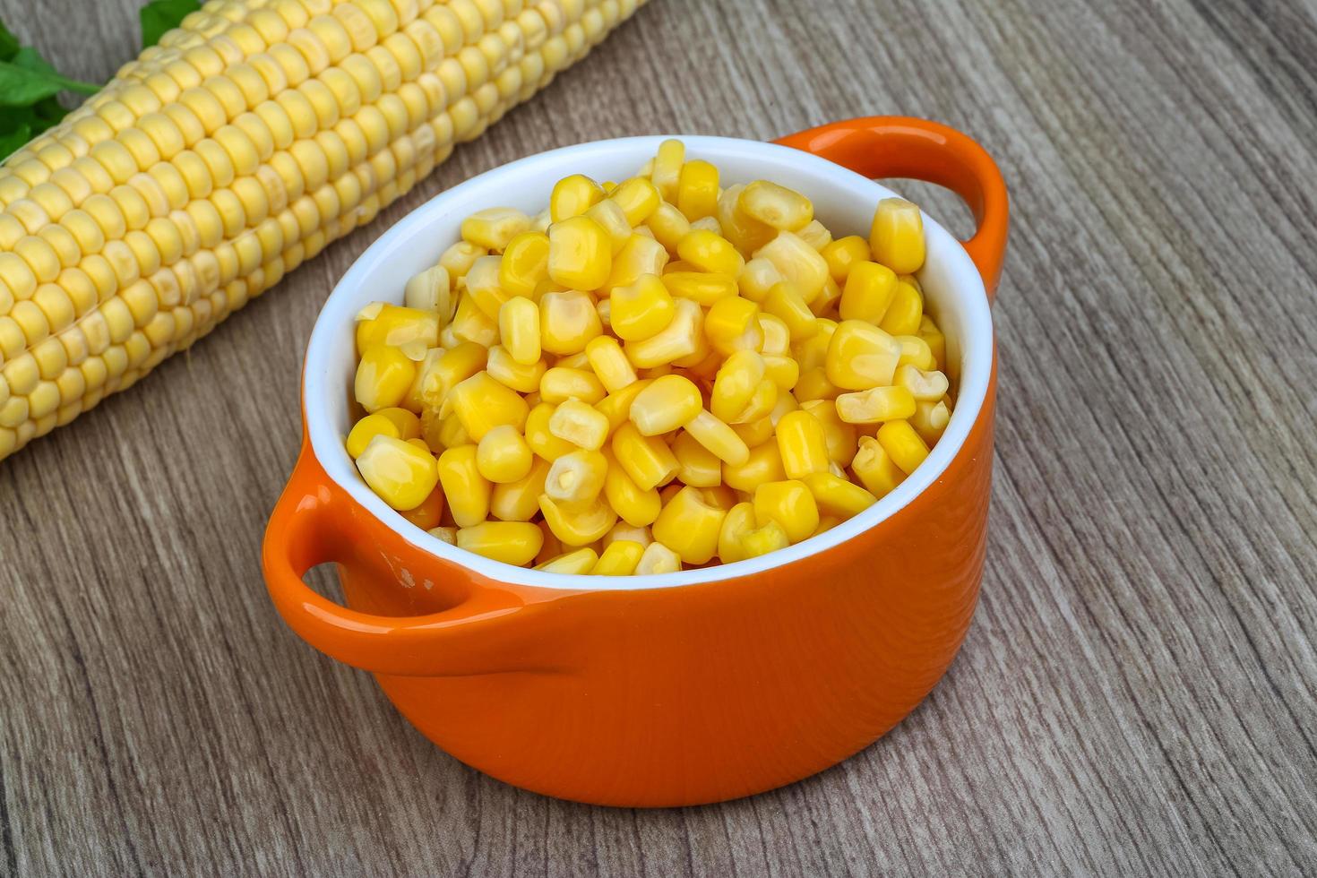 Sweet corn on wood photo