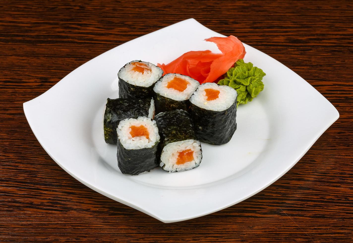 Salmon maki on plate photo