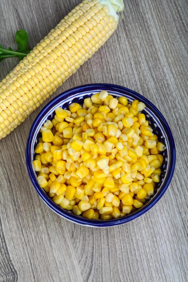 Sweet corn on wood photo