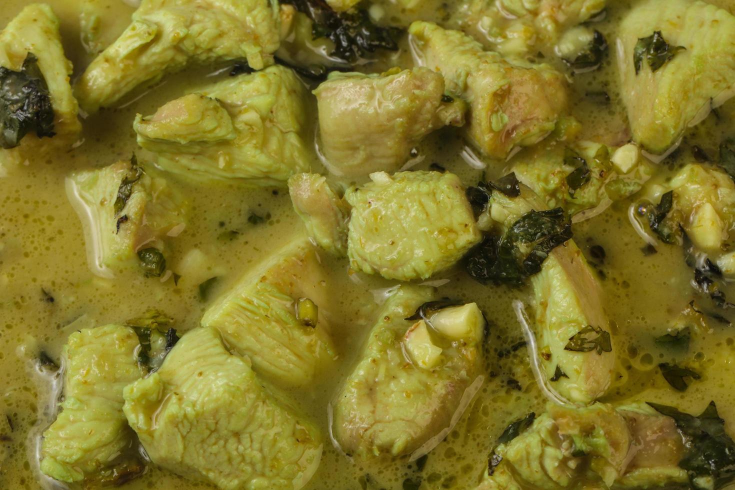 Green Curry on wood photo