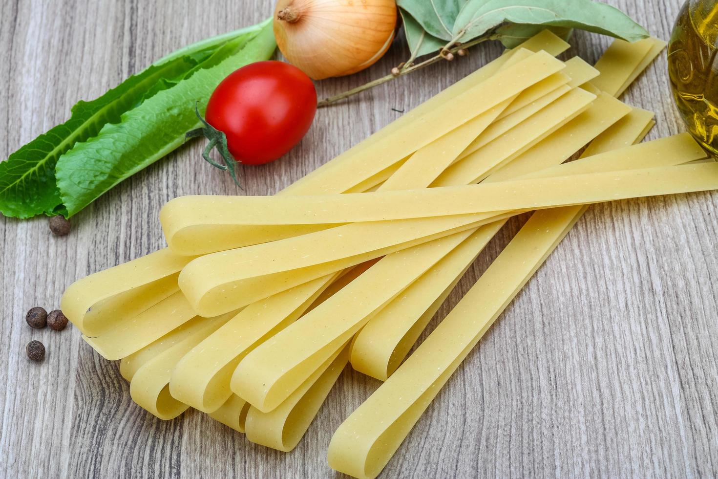 Fettuccine on wood photo