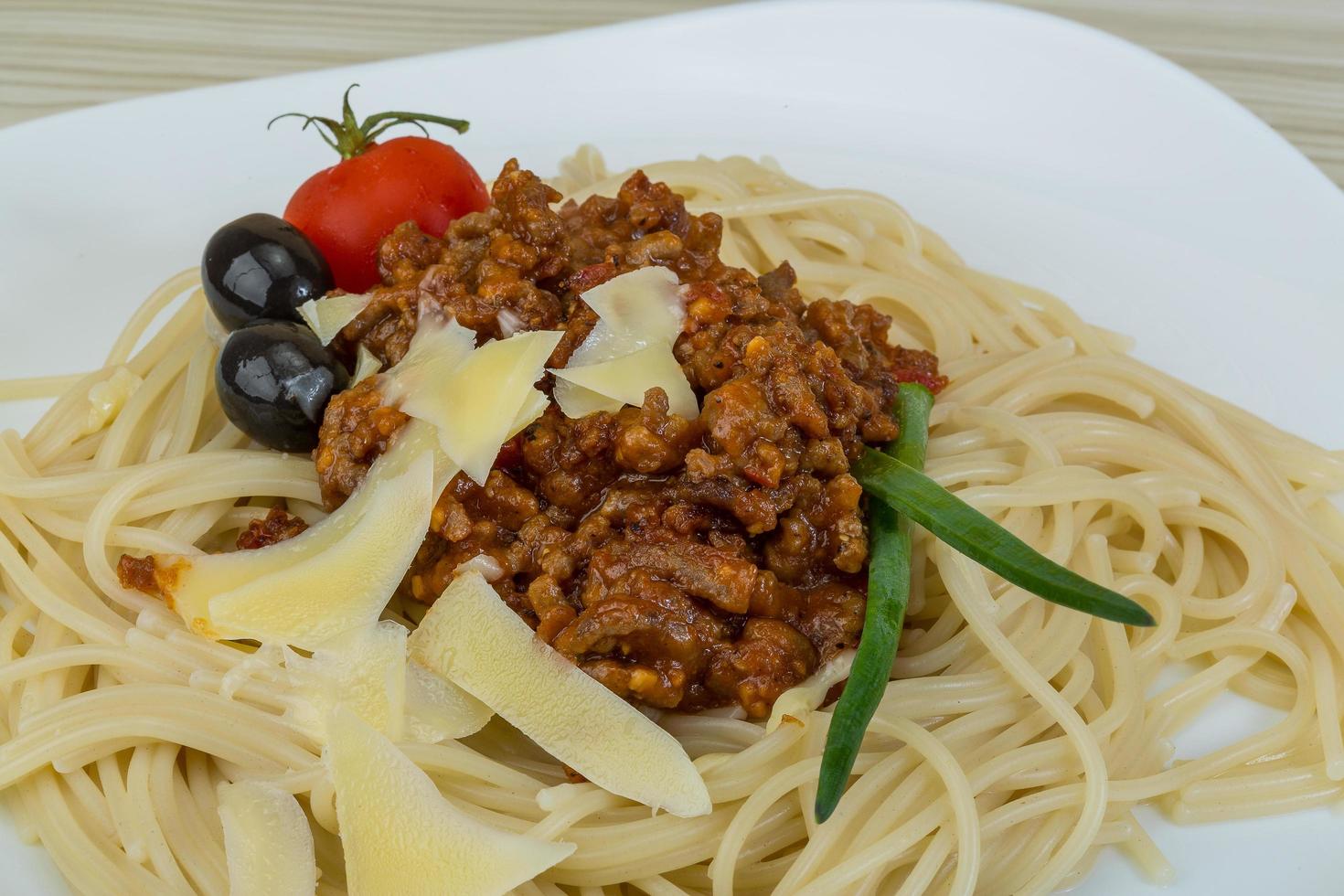 Spaghetti Bolognese on wood photo