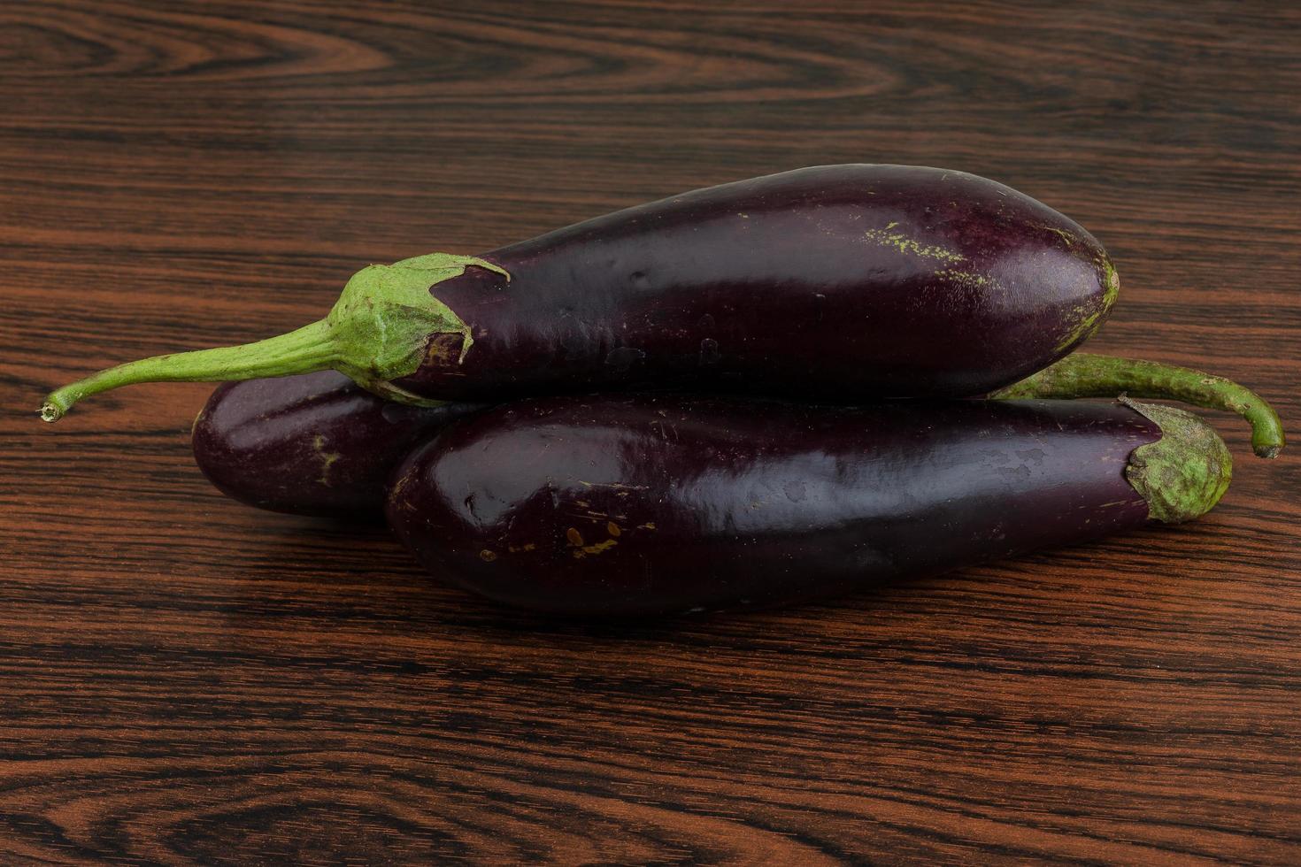 Aubergine on wood photo