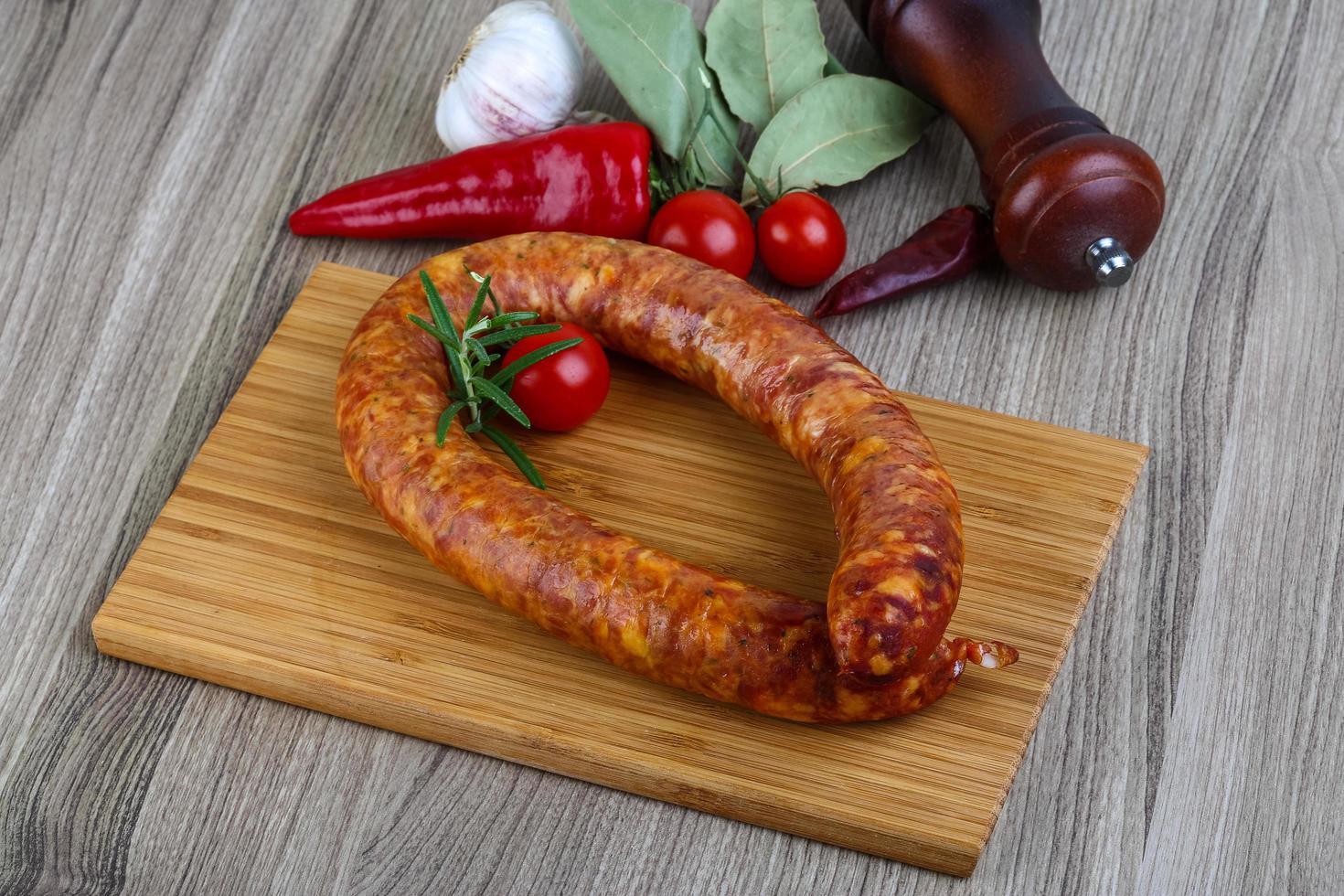 Sausage ring on wood photo