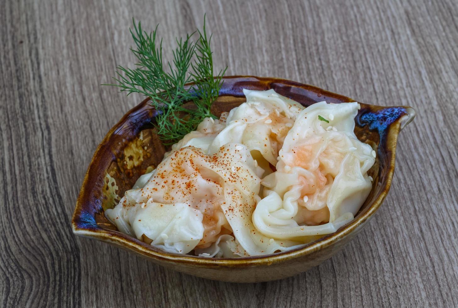 Shrimp wonton on wood photo
