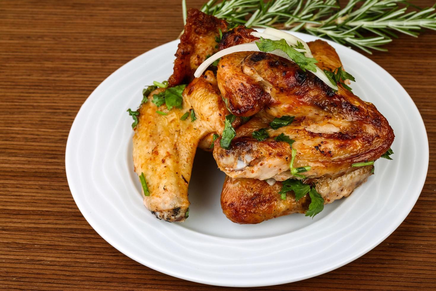 Chicken wings on wood photo