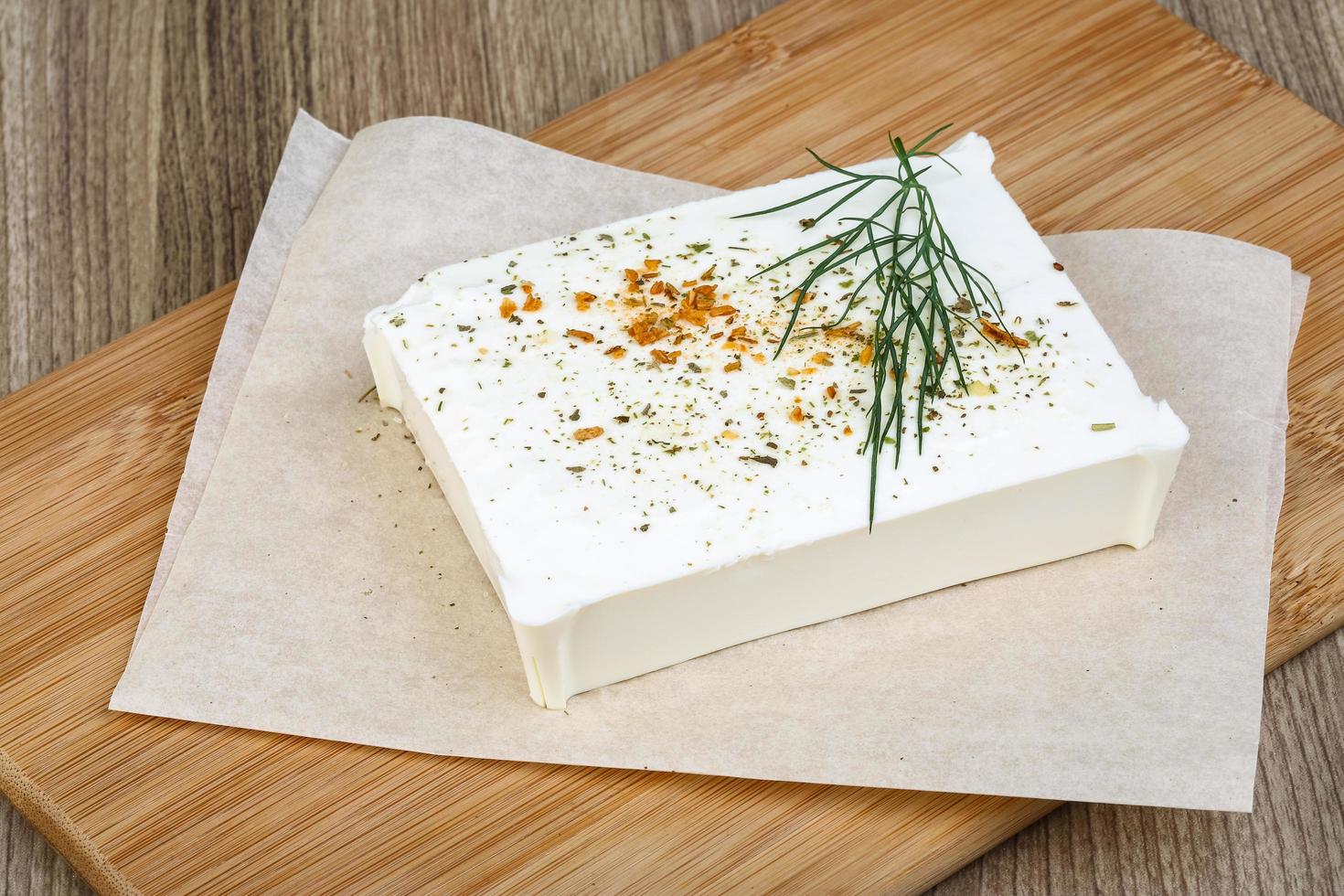 Feta cheese on wood photo